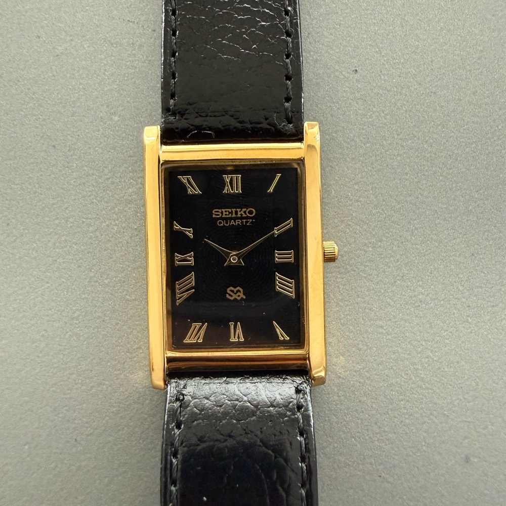 Vintage Seiko Tank watch Black dial Gold bezel with Black Strap